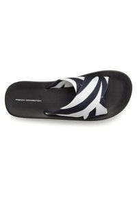 Black flip-flop featuring white and navy striped fabric straps, flat sole, and a smooth texture. Brand logo displayed on the insole.