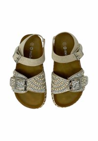 Sandali beige con tomaia in tessuto testurizzato, decorazioni in pietre preziose, fibbia metallica e suola imbottita.