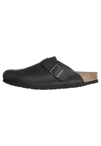 Schwarzer Leder-Clog mit breitem Riemen und silberner Schnalle, Korkfußbett und Gummisohle. Konturierte Form zur Fußunterstützung.