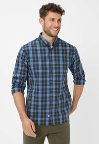 Karierte Hemd in Blau, Grün und Marine. Hemd mit Knopfleiste, langen Ärmeln, die an den Bündchen hochgekrempelt sind, aus leichtem Stoff gefertigt.