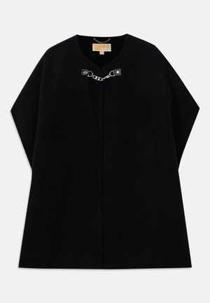 Black wool poncho with a v-neckline, featuring a silver chain closure and angled sleeves. Textured fabric with minimal design elements.