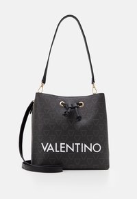 Black bucket bag with gold-tone hardware, textured synthetic material, and textured triangular pattern. Features a large white "VALENTINO" logo.