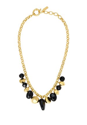 Collier chaîne en or avec breloques en perles irrégulières polies noires et dorées alternées et fermoir rond avec chaînette rallonge réglable.