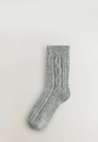 Gray ribbed sock featuring a cable-knit pattern along the side. Soft texture, mid-calf length, rounded toe, and elasticized cuff.