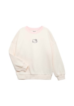 Felpa color rosa chiaro e crema realizzata in materiale morbido, con una piccola stampa di Hello Kitty sul petto, polsini e collo a costine.
