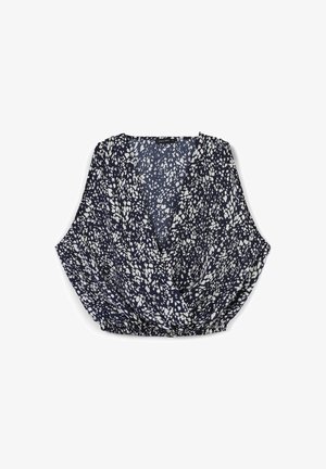 Blusa senza maniche blu navy con un motivo floreale bianco, caratterizzata da un design avvolgente e orlo arricciato per una vestibilità comoda.