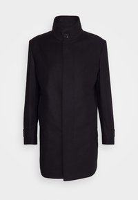 Manteau homme noir à simple boutonnage avec col haut et fermeture par boutons, manches longues, et ourlet droit.