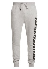 Grijze sweatpants van katoen met een trekkoord in de taille, zijzakken en 'ALPHA INDUSTRIES' in vet zwart bedrukt langs het linkerbeen.