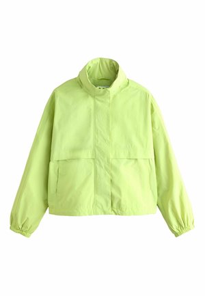 Hellgrüne Jacke mit Reißverschluss, hohem Kragen, langen Ärmeln mit elastischen Bündchen und zwei vorderen Klappentaschen.