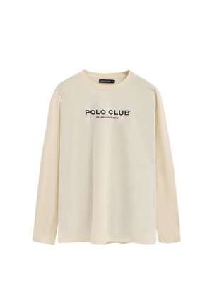 Koszulka z długim rękawem w kolorze kremowym, wykonana z bawełny. Na przodzie znajduje się nadruk "POLO CLUB" oraz "USTANOWIONA W 2012 R." w ciemnoniebieskim kolorze.
