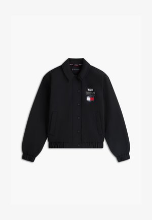 Black button-up jacket with elastic cuffs and hem, featuring Cadillac Formula 1 Team and Tommy Hilfiger logos on the left chest.