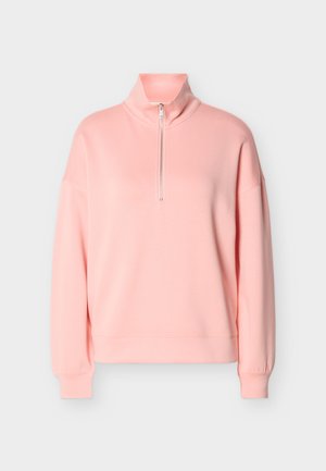 Pulover roz pal cu mânecă lungă, fermoar scurt în față și guler ridicat, cu manșete striate și croială lejeră.