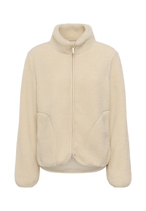 Veste en polaire beige avec fermeture éclair frontale complète, col montant, manches longues et deux poches latérales, présentée sur fond blanc.