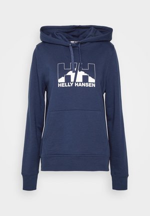 Navy blue hoodie made of soft fabric, featuring a front pocket and adjustable drawstring hood. The front displays a white logo with "Helly Hansen."