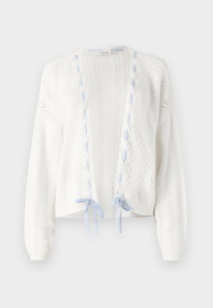 Balta megzta kardiganas su erškėtinių raštų, su šviesiai mėlynais akcentais ir raišteliais priekyje. Ilgos rankovės ir atvira priekinė dalis.