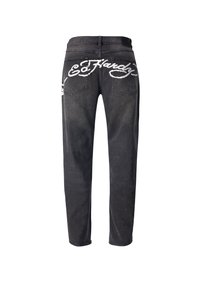 Černé denimové džíny s volným střihem, s bílými vyšívanými logy na zadních kapsách a jemným vyblednutím po celém povrchu.