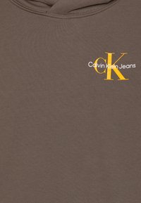Calvin Klein Jeans SMALL MONOGRAM HOODIE UNISEX - Jersey con capucha - dark brown
