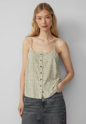 Haut à imprimé floral vert avec des bretelles fines, présentant un devant à boutons et un ourlet légèrement arrondi. Tissu texturé avec une sensation légère.