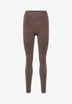 Bruine, rekbare leggings gemaakt van een gestructureerde stof. Hoog op de taille ontwerp met een aansluitende silhoët. Minimale branding nabij de tailleband.