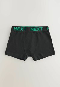 Svarta boxertoppar i mjukt material med en grön elastisk midja som har texten "NEXT" i ett upprepande mönster.