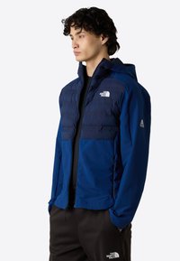 The North Face M MOUNTAIN ATHLETICS CARI HOODED JACKET - Winterjas - estate blue summit navy
