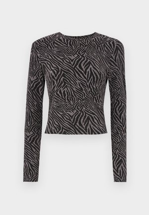Long-sleeve black top featuring a textured zebra pattern with metallic accents. Fitted design, round neckline, and cropped cut.