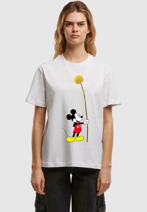 White cotton t-shirt featuring a graphic of Mickey Mouse in red shorts and yellow shoes, holding a yellow flower on a stick.