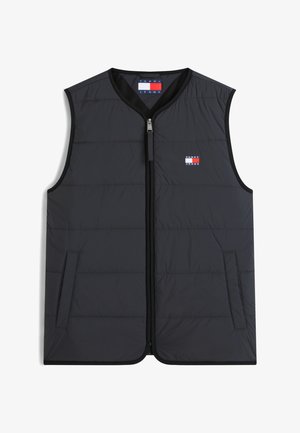 Crna prozirna prsluk bez rukava s prednjim patentnim zatvaračem, dva bočna džepa i malim crvenim, bijelim i plavim logotipom Tommy Jeans na prsima.