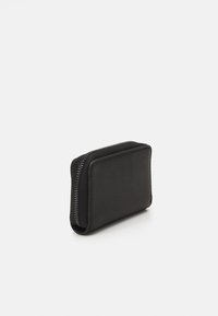 Calvin Klein DAILY SMALL ZIP AROUND - Novčanik - black