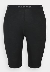Fekete, közép-hosszú leggings, puha tapintással, széles, világosszürke "icebreaker" márkázott elasztikus derékkal. Varrott és varrás nélküli kivitel.