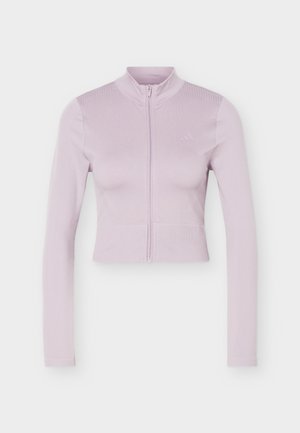 Φωτεινό μωβ, μακρυμάνικο crop jacket με φερμουάρ, ψηλό γιακά και διακριτικές ραφές σε απλό φόντο.