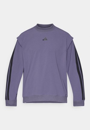 Violetti pitkähihainen huppari, jossa on korkea kaulus, musta Adidas-logo ja kontrastiväriset mustat raidat hihoissa. Pehmeä kangastuntuma.