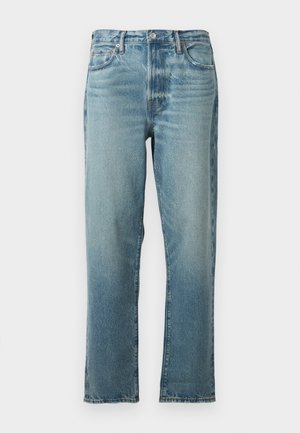 Jean en denim bleu clair avec une coupe droite, présentant des zones décolorées et un léger effet de frottement. Design traditionnel à cinq poches avec ferronnerie métallique.