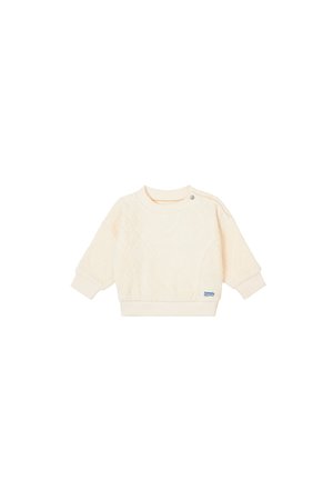 Cremefarbenes Baumwollpullover mit einem rautenförmigen Steppmuster, Rundhalsausschnitt und Druckknopfdetails an der Schulter. Gerippte Bündchen und Saum.