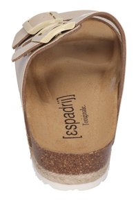 Beige patent espadrille sandal with dual adjustable buckle straps, cork footbed, and jute-wrapped platform sole. Inner branding visible.