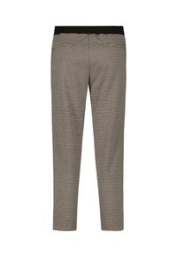 Pantalons à motif pied-de-poule noir et blanc avec une finition texturée, jambes fuselées et une taille lisse noire.