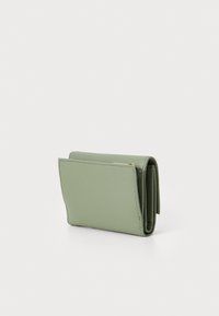 Green leather wallet with a textured finish, compact rectangular shape, folded design, and a small gold zipper detail.