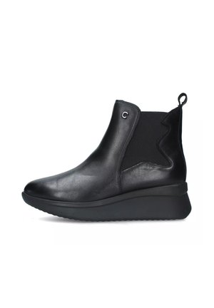 Stivaletti in pelle nera con pannelli laterali elastici, design elegante, punta arrotondata e suola a zeppa per un'altezza aggiuntiva. Nota linguetta sul retro.
