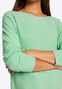 Rich & Royal Strickpullover - green tea