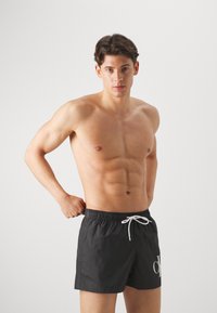 Calvin Klein Swimwear DRAWSTRING - Swimming shorts - black