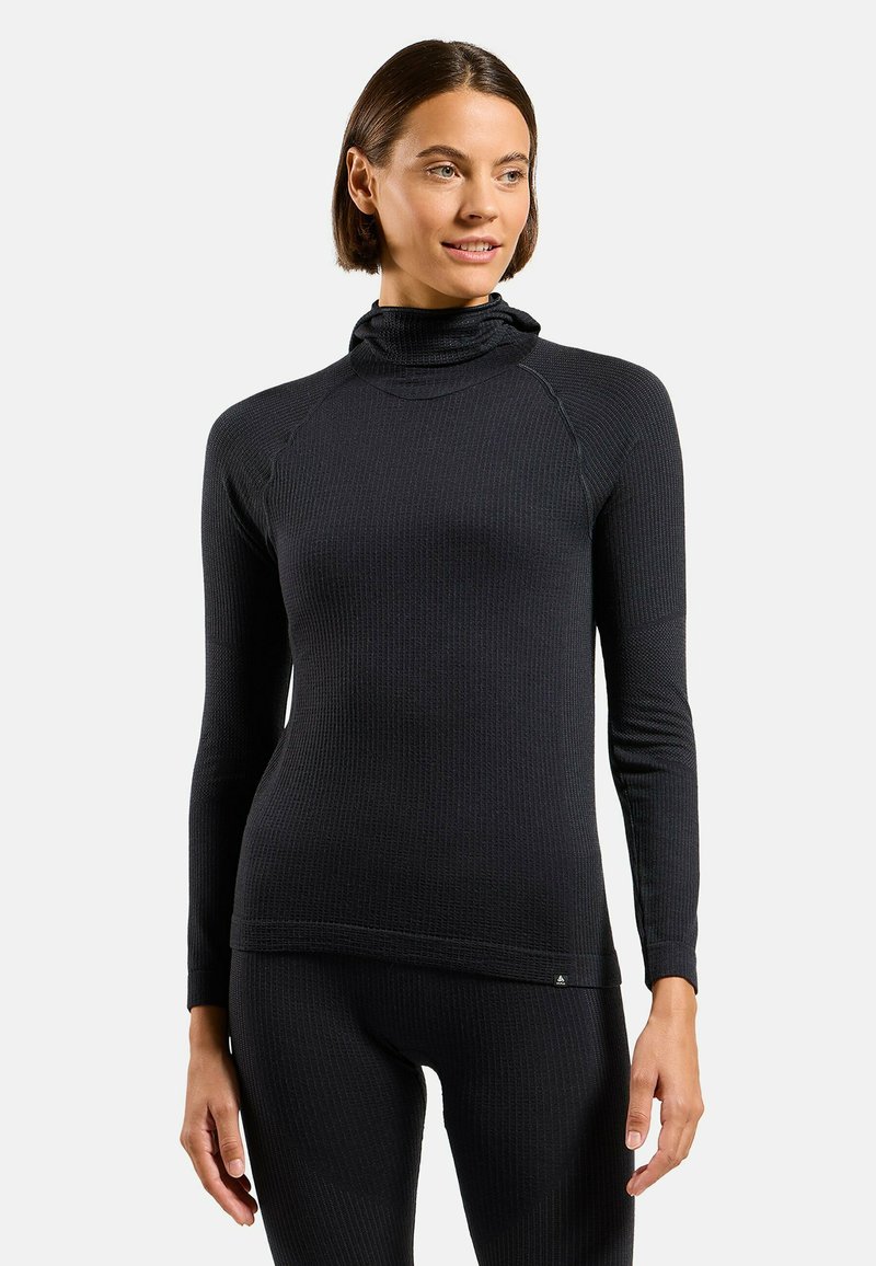 Black, long-sleeve thermal top with a mock neck, ribbed texture, and fitted design. Features raglan sleeves and a subtle logo accent.