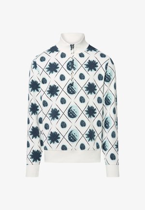 Weißer Pullover mit hohem Kragen und halbem Reißverschluss. Verziert mit dunkelblauen Blumen- und Blattmustern in einer Rautengitteranordnung.