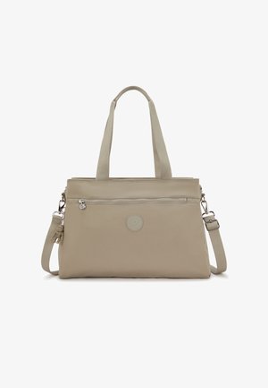 Beige draagtas met twee schouderbanden, voorvak met rits, rond merkembleem en een klein monkey sleutelhangerbedeltje eraan bevestigd.