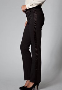 Black trousers with a slim fit, featuring a satin side panel. The fabric has a smooth texture and a straight-leg design.