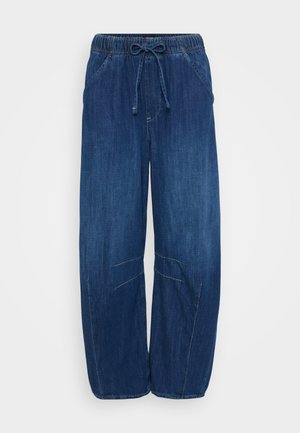 Denim pants in dark blue with an elastic waist and drawstring. Features two side pockets and stitching accents, tapered leg openings.