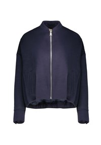 Giacca bomber blu navy realizzata in tessuto strutturato, con chiusura frontale con zip, spalle scese e tasche laterali. Design a lunghezza corta.