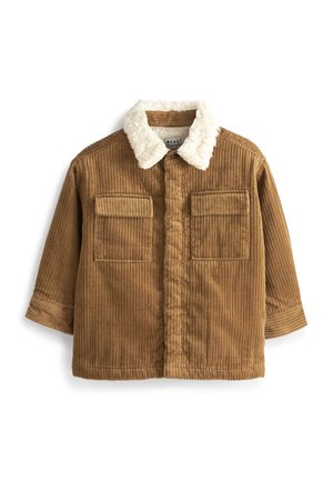 Giacca marrone in velluto a coste con colletto in pelliccia sintetica bianca, chiusura con bottoni sul davanti, due tasche a patta sul petto e maniche lunghe.