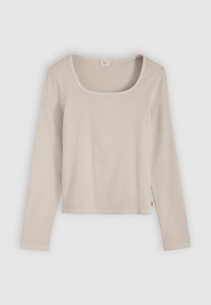 Ilgas smėlio spalvos marškinėliai su ilgomis rankovėmis ir kvadratinio formos iškirpte, pagaminti iš ribbingo audinio, pasižymintys tiesiu apdailos kraštu ir šonine siūlės etikete prekės ženklui.