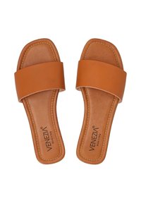 Bruine leren slippers met een brede band en een gladde, vlakke zool. Geconfectioneerde details langs de randen. Gemaakt in Italië.