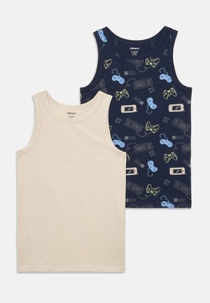 Two sleeveless children's tank tops, one beige and one navy with colorful gaming controller and keyboard patterns.